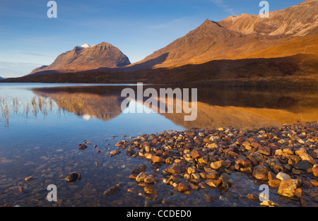 Liathach and Beinn Eighe reflected in Loch Clair, Torridon, Ross-shire, Scotland. Stock Photo