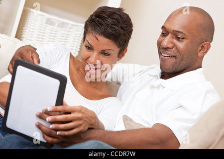 African American Man Woman Couple Using Tablet Computer Stock Photo