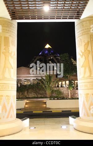 A view from the Wafi Mall in Dubai to the Raffles Hotel, shaped in a pyramid. Stock Photo