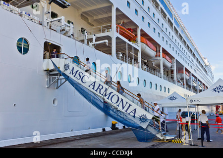 Detail of cruise ship MSC Armonia docked showing mooring lines or hawsers Stock Photo