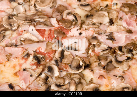 Delicious Italian pizza with mushrooms and ham Stock Photo