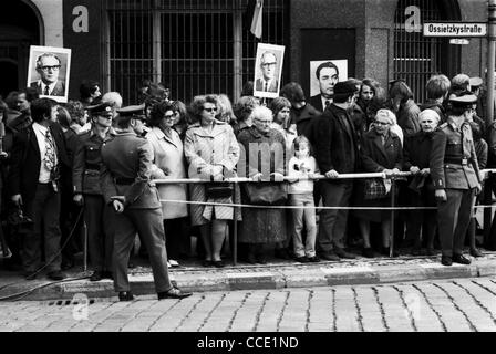 People with portraits of Honecker and Brezhnev at the state visit of the Soviet party leader Brezhnev 1973 in East Berlin. Stock Photo