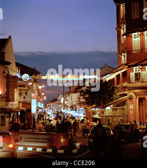 Strret life at Jonker's Walk night market in Malacca Melaka in Malaysia in Far East Southeast Asia. Travel Stock Photo