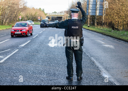 Police officer directing traffic Stock Photo