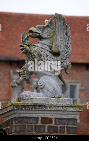 Heraldic carved stone dragon gargoyle,  Layer Marney Tower, Tiptree, Essex, England Stock Photo