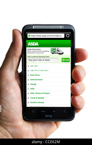 Shopping online at ASDA on an HTC smartphone Stock Photo