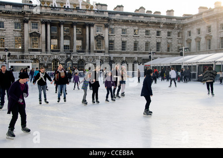 People ice skating at Somerset House Ice Rink, London England United ...