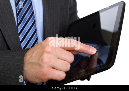 Finger pointing on digital tablet Stock Photo