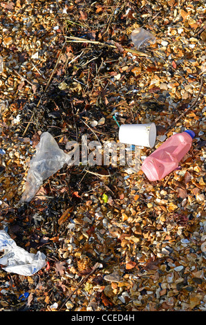 plastic rubbish washed up on beach Stock Photo