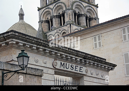 Angouleme SW France, the belfry of the cathedral, and the arch over the original entrance to the Museum of Angouleme Stock Photo