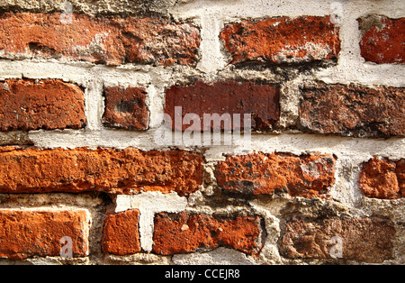 Ancient brick wall, may be used as background Stock Photo