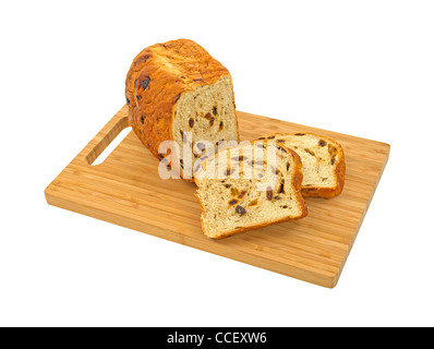 Raisin bread sliced on wood cutting board Stock Photo