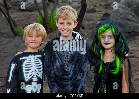 Portrait of three friends in Halloween costume Stock Photo