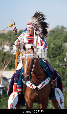 A Native American Indian man riding bareback on a horse in the Stock ...