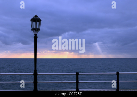 Winter seascape with lamp post in foreground,Worthing Stock Photo