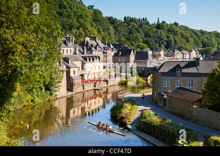 A four place sculler in the foreground of this image from Dinan, Brittany, France. The medieval port is one of the best preserve Stock Photo