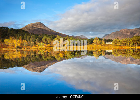 Loch Coulin in the Torridon Mountains, Scotland.  Captured on a still morning in October with reflections of Coulin Lodge Stock Photo