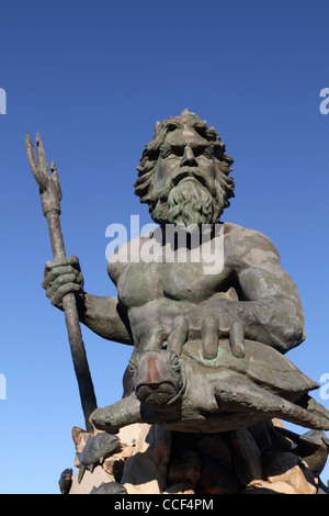A closeup of a cast bronze statue of Neptune on the Virginia Beach, Va, boardwalk. Stock Photo