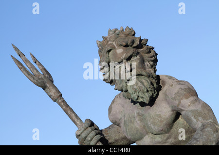 A closeup of a cast bronze statue of Neptune on the Virginia Beach, Va, boardwalk. Stock Photo