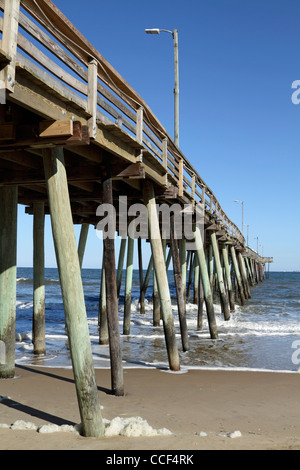 A fishing pier jutting out into the Atlantic Ocean. Virginia Beach, VA. USA Stock Photo