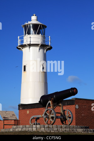 Gun and lighthouse the Heugh Battery Hartlepool Headland, north east England, UK Stock Photo