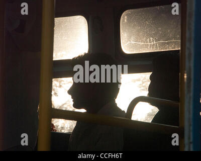 Bus passengers in the station in Bangalore India Stock Photo