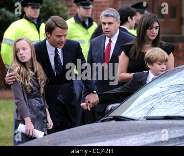 Dec 11, 2010 - Raleigh, North Carolina; USA - Former Senator JOHN EDWARDS with his children EMMA CLAIRE EDWARDS, JACK EDWARDS, and CATE EDWARDS leave the funeral service for ELIZABETH EDWARDS who passed away earlier in the week from a long battle with cancer.  The funeral service was held at the Ede Stock Photo