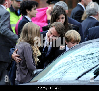 Dec 11, 2010 - Raleigh, North Carolina; USA - Former Senator JOHN EDWARDS with his children EMMA CLAIRE EDWARDS, JACK EDWARDS, and CATE EDWARDS leave the funeral service for ELIZABETH EDWARDS who passed away earlier in the week from a long battle with cancer.  The funeral service was held at the Ede Stock Photo