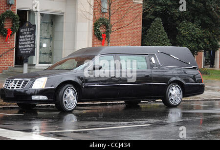 Dec 11, 2010 - Raleigh, North Carolina; USA - The hearse with the casket of ELIZABETH EDWARDS leaves the memorial service who passed away earlier in the week from a long battle with cancer.  The funeral service was held at the Edenton Street United Methodist Church located in downtown Raleigh.  Copy Stock Photo