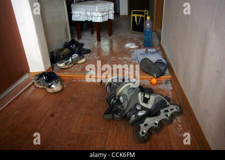 Dec 1, 2010 - Yeonpyeong Island, South Korea - Personal belongings including shoes and rollerblades left behind by residents who deserted the island. Dozens of artillery shells fired by North Korea struck the island on November 23, resulting in four deaths and further injuries and prompting return f Stock Photo