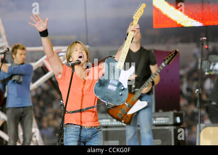 Nov. 25, 2010 - Arlington, Texas, United States of America - Country music superstar Keith Urban performs the halftime show as the New Orleans Saints lead the Dallas Cowboys 20-6 at Cowboys Stadium in Arlington, Texas. (Credit Image: © Steven Leija/Southcreek Global/ZUMAPRESS.com) Stock Photo