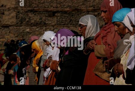 Nov 13, 2010 - Kashmir, Srinagar, India - Outside the shrine of Shah Hamadan, on his death anniversary in Srinagar, the summer capital of Indian Kashmir. Thousands of Kashmiri Sufi Muslim devotees thronged the shrine of Saint Hamdani, who traveled to Kashmir from Iran to spread Islam in the region.  Stock Photo