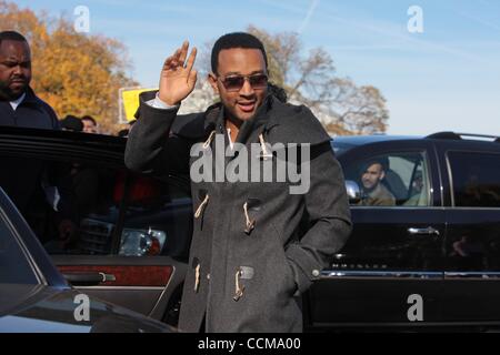 Oct 30, 2010 - Washington, District of Columbia, U.S. - JOHN LEGEND singer-songwriter waves to fans as he leaves the Rally To Restore Sanity And/Or Fear at the National Mall. (Credit Image: © Gary Dwight Miller/ZUMApress.com) Stock Photo