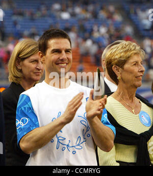 Jun 16, 2004; Los Angeles, CA, USA; Actor TOM CRUISE (L) stands next to his mother MARY LEE MAPOTHER  (R) after he participated in the Olympic Torch  Relay Ceremony at Dodger Stadium on June 16, 2004 in Los Angeles, Ca. The global Olympic Torch Relay began the first of its four cities that will host Stock Photo