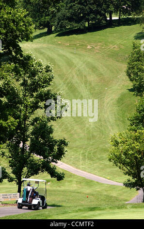 Jun 24, 2004 - Miami Township, Ohio, USA - Golfers traverse the hilly coarse, on a cart path, at Shawnee Lookout Park , off of Brower Road, in the far Westside of the Township. (Credit Image: © Ken Stewart/ZUMA Press) Stock Photo