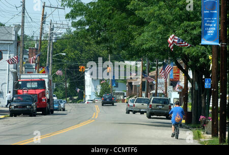 Jun 24, 2004 - Miami Township, Ohio, USA - CLEVES: A teen rides his bike up Miami Avenue the main street through Cleves, Ohio. (Credit Image: © Ken Stewart/ZUMA Press) Stock Photo