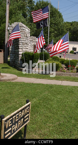 Jun 24, 2004 - Miami Township, Ohio, USA - ADDYSTON :  Manicured lawns and numorous flags surround  the Veterans Park  WWII Memorial on Main Street. (Credit Image: © Ken Stewart/ZUMA Press) Stock Photo