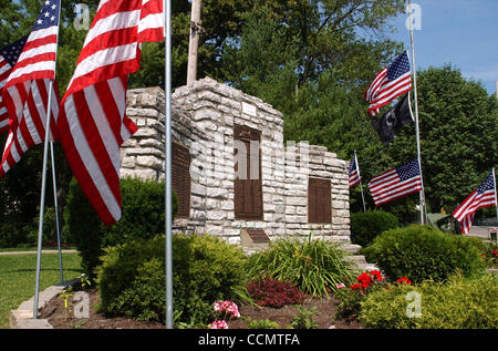 Jun 24, 2004 - Miami Township, Ohio, USA - ADDYSTON :  Manicured lawns and numorous flags surround  the Veterans Park  WWII Memorial on Main Street. (Credit Image: © Ken Stewart/ZUMA Press) Stock Photo