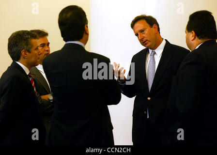 Tony Garza, US Ambassador to Mexico, (right) talks with members of the Businessmen Against Smuggling Coalition, at a business breakfast in Mexico City on Thursday July 29, 2004. Photo by Sarah Martone/Special to Express-News Stock Photo