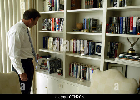 Tony Garza, US Ambassador to Mexico, points out his books on Texas in his library at the Ambassador's residence in Mexico City on Thursday July 29, 2004.  (Photo By Sarah Martone) Stock Photo