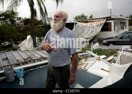 Charlie Bergman looks over the damage around his mobile home in Punta Gorda, Florida, Monday, 16 August 2004. Bergman's home, which only lost its porch roof, had other homes around it destroyed. Damage from Hurricane Charley is being estimated at $11 billion. Photo by CHRIS LIVINGSTON/ ZUMA Press Stock Photo