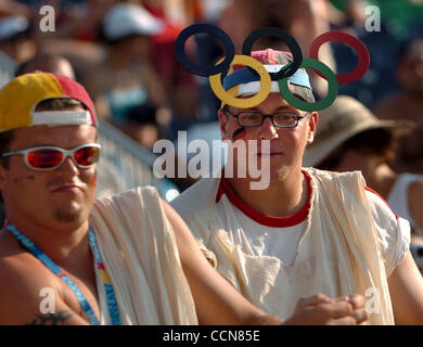 POSTCARD FROM ATHENS It may not make the Paris catwalks-- and it definitely won't keep the sun out of his eyes-- but this custom Oly Ring cap had front row seats at the German beach volleyball contest on Wednesday, Aug. 18, 2004,at the Faliro Olympic Beach Volley Center in Athens, Greece. (Contra Co Stock Photo