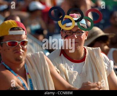 POSTCARD FROM ATHENS.It may not make the Paris catwalks-- and it definitely won't keep the sun out of his eyes-- but this custom Oly Ring cap had front row seats at the German beach volleyball contest on Wednesday, Aug. 18, 2004,at the Faliro Olympic Beach Volley Center in Athens, Greece. (Contra Co Stock Photo