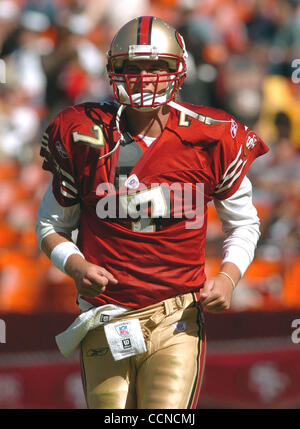 San Francisco 49ers quarterback Ken Dorsey, #7, gets hit by Oakland Raiders  DeLawrence Grant, #59, in the 2nd quarter of their exhibition game on  Saturday, August 14, 2004 at 3Com Park in