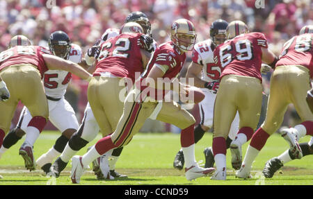 San Francisco, California, USA. 9th Jan, 1993. San Francisco 49ers vs.  Washington Redskins at Candlestick Park Saturday, January 9,1993. 49ers  Beat Redskins 20-13. San Francisco 49ers linebacker Bill Romanowski (53)  grabs Washington