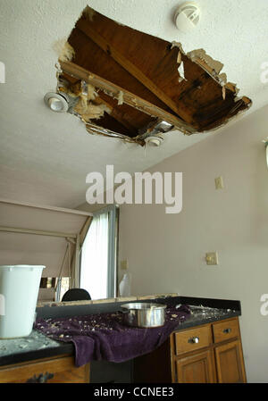 092904 TC MET Stuart...A Golfwood Lane home that housed six female ARC of Martin County residents is now vacant and in need of repair.  This hole in the ceiling off of the kitchen area was caused by a tree that crashed through the roof from Hurricane Frances.  Additional water came gushing through f Stock Photo