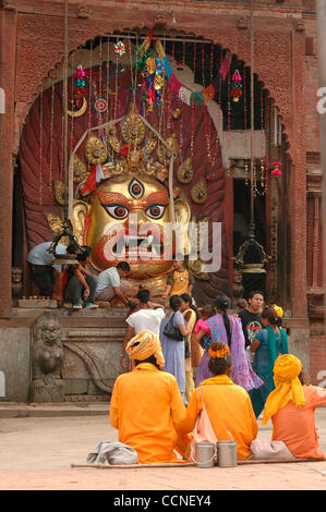 Oct 03, 2004; Basantapur Durbar Square, Kathmandu, NEPAL; Living Goddess Kumari Festival: The large facial sculpture of the god Swet Bhairab is brought out at the beginning of the Indra Jatra festival, and is left in full view for the entire ceremony. The god was originally introduced at the time of Stock Photo