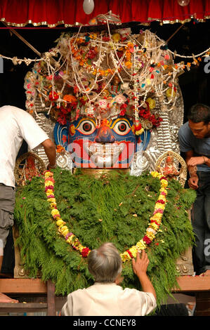 Oct 03, 2004; Basantapur Durbar Square, Kathmandu, NEPAL; Living Goddess Kumari Festival: The large facial sculpture of the god Swet Bhairab is brought out at the beginning of the Indra Jatra festival, and is left in full view for the entire ceremony. The god was originally introduced at the time of Stock Photo