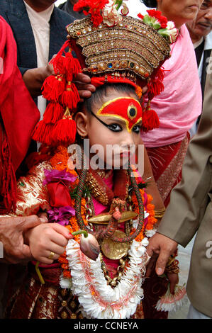 Oct 03, 2004; Basantapur Durbar Square, Kathmandu , NEPAL; Living Goddess Kumari Festival: One of the main events of the Festival of Indra Jatra is the Kumari Jatra (also called the Rath Jatra, or Chariot Festival). The primary event of the Kumari Jatra is the pulling of the three-tiered chariot bea Stock Photo