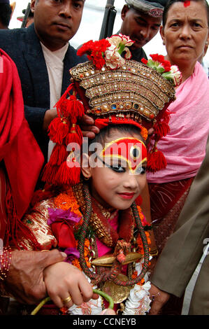 Oct 03, 2004; Basantapur Durbar Square, Kathmandu , NEPAL; Living Goddess Kumari Festival: One of the main events of the Festival of Indra Jatra is the Kumari Jatra (also called the Rath Jatra, or Chariot Festival). The primary event of the Kumari Jatra is the pulling of the three-tiered chariot bea Stock Photo